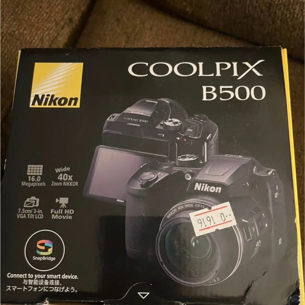 Nikon Black Camera with Purple Flexible Tripod